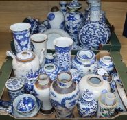 A large collection of 19th century Chinese blue and white vases, bowls, etc. and two famille rose