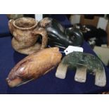 Four Chinese archaistic jade or hardstone zoomorphic carvings, including a pig, elephant head, a