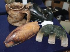 Four Chinese archaistic jade or hardstone zoomorphic carvings, including a pig, elephant head, a