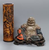 A Chinese bamboo perfume holder and a Chinese lacquer figure of Budai