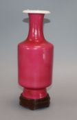 A Chinese ruby glazed vase, Juren tang mark, Republic period, H. 22.5cm, wood standProvenance -