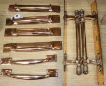 Four pairs of cast brass door handles