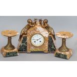 A French marble clock garniture with a boy and girl surmounts height 25cm