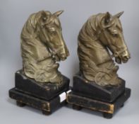 A pair of cast bronze horse heads height 40cm