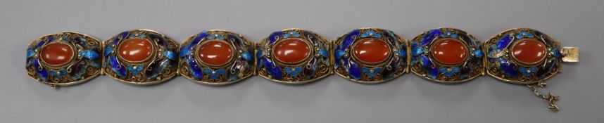 A Chinese gilt white metal filligree, enamel and cabochon carnelian set bracelet, 18cm.