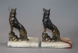 A pair of Art Deco Alsatian bookends