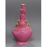 A Chinese pink ground 'lotus' bottle vase, moulded Qianlong mark but Republic period, H. 17.