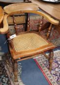A Victorian cane seat smoker's bow chair