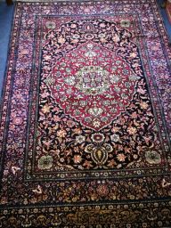 A Kashan blue ground rug 200 x 143cm