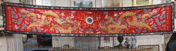 A Chinese embroidered silk 'dragon' wall hanging, early 20th century