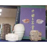 Three Chinese archaistic jade and hardstone cong and a white stone carving, and a Chinese language