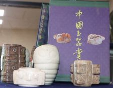 Three Chinese archaistic jade and hardstone cong and a white stone carving, and a Chinese language