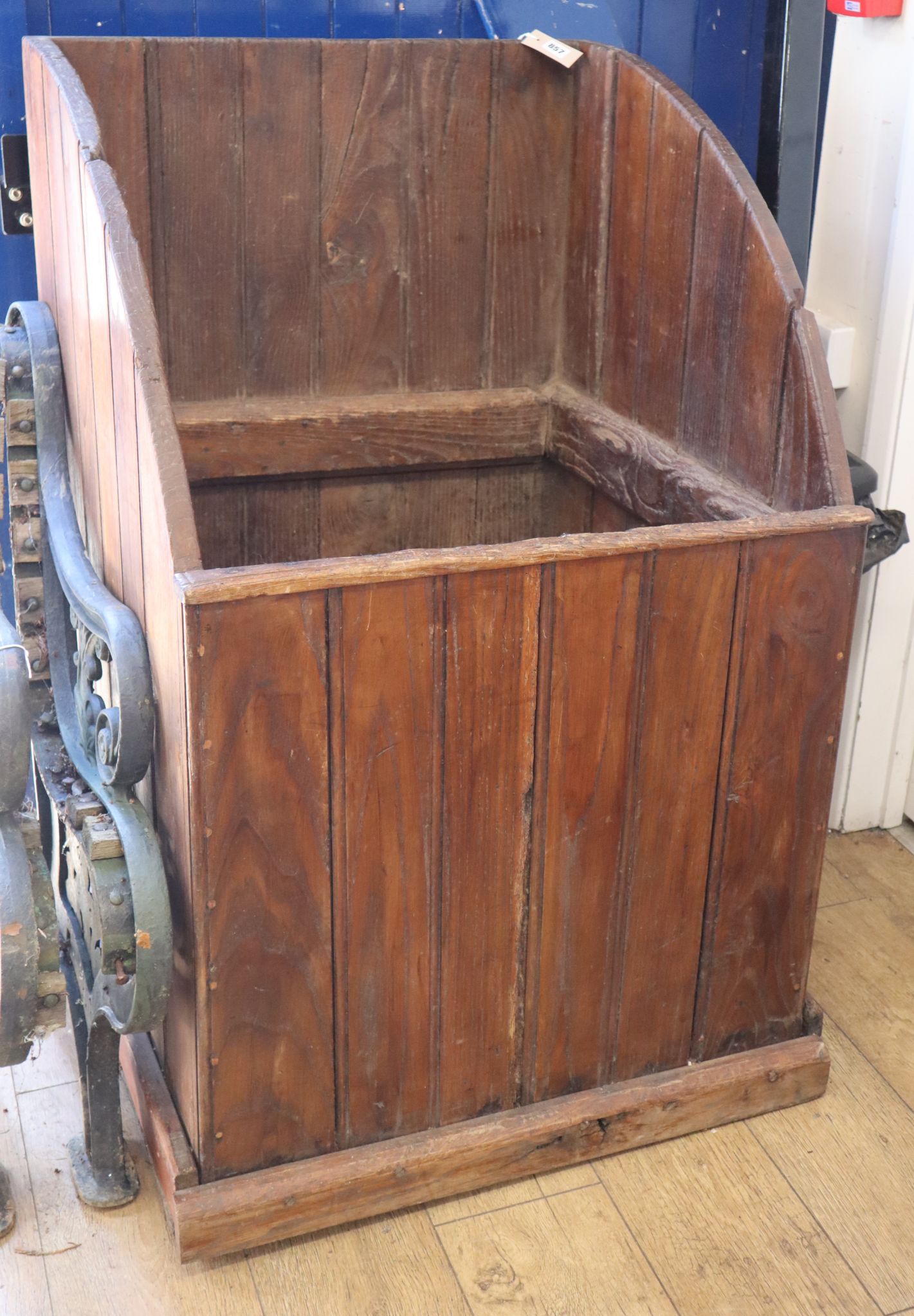 A 19th century panelled elm manger height 110cm