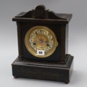 A German fourteen day lacquered mantel clock height 32cm