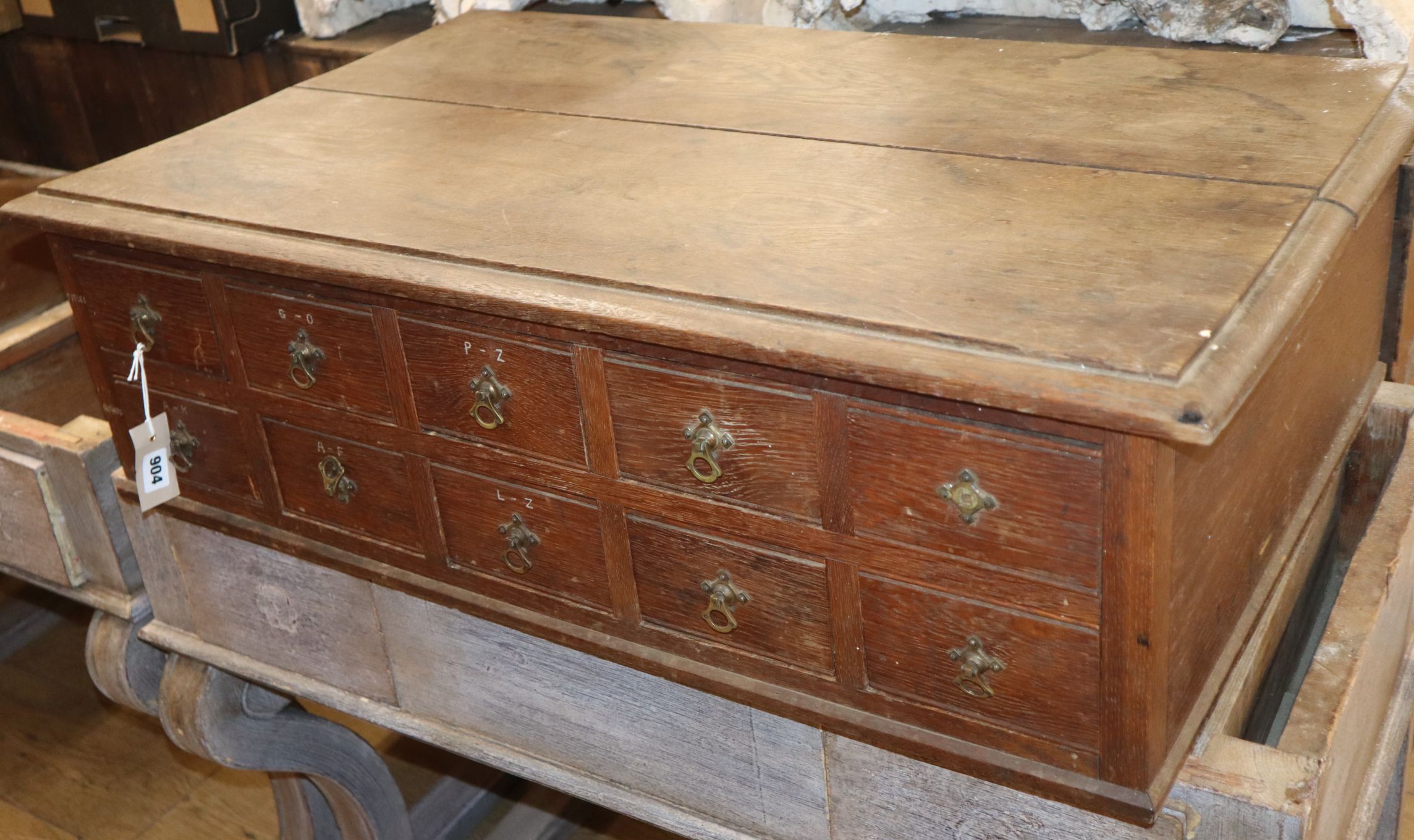 A late Victorian oak ten drawer office chest W.90cm
