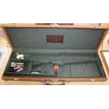 A tan leather shotgun case by Pietro Beretta