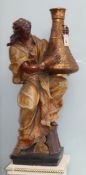 A pair of Austrian painted terracotta figures Largest 98cm