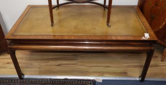 A mahogany coffee table with leather top W.125cm