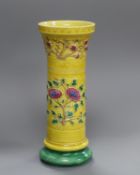 A 19th century Chinese Qing famille jaune carved floral spill vase 15cm high