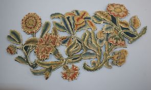 Eleven late 17th/early 18th century floral appliqué stumpworked motifs and a similar larger motif