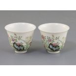 A pair of Chinese famille rose cups, four character mark, H. 5.2cm