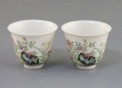 A pair of Chinese famille rose cups, four character mark, H. 5.2cm