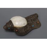 A Tibetan mounted conch shell