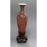 A Chinese sang de boeuf glazed small vase, Kangxi mark but Republic period, H. 18.5cm including wood