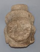 A 10 - 12th century Cambodian Khmer sandstone Buddha head height 15cm