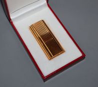 A cased Must de Cartier gold plated lighter