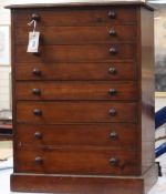 A pine eight drawer collector's chest W.49cm
