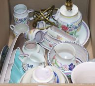 A quantity of Poole pottery decorative items and tableware, comprising a number of floral-
