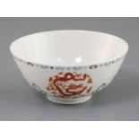 A Chinese doucai 'dragon' bowl, six character mark, D. 13cm