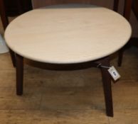 A bleached oak cricket type low occasional table W.67cm