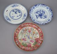 A Chinese famille rose dish, painted with figures and two 18th century Chinese blue and white