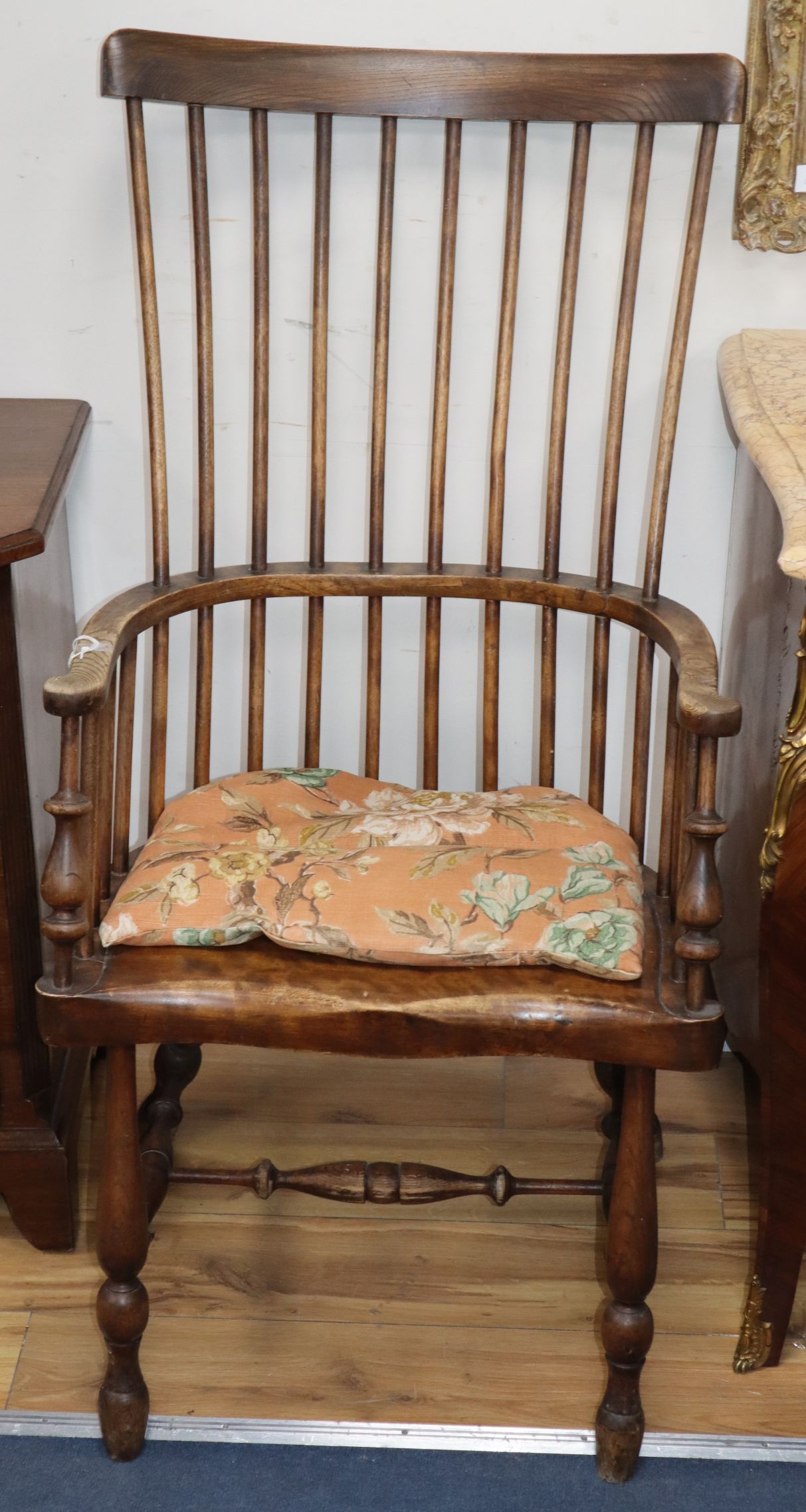 A stick-back Windsor armchair with turned supports