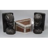 A pair of African carved bookends and an Anglo Indian carved wood box