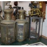 An engraved glass hexagonal hall lantern and two other lanterns