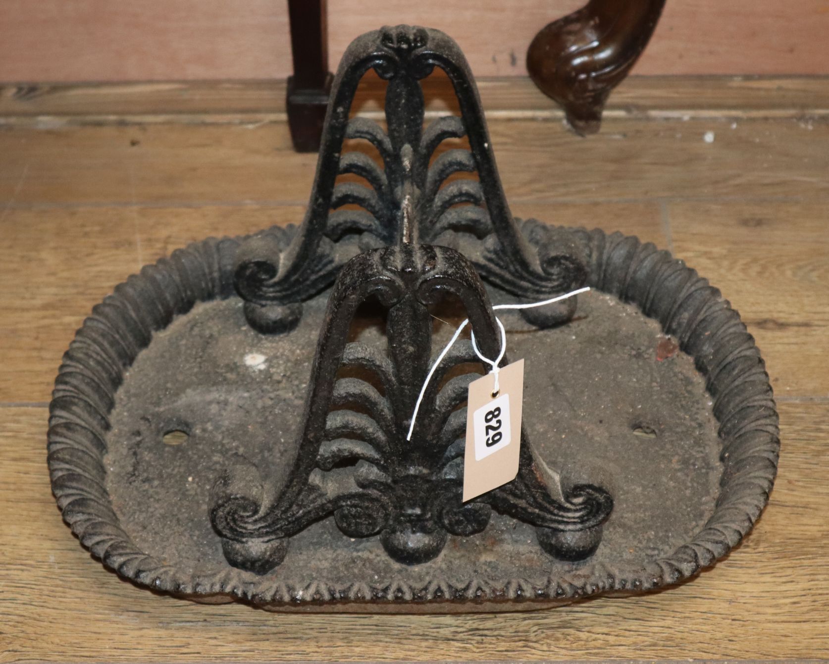 A 19th century cast iron boot scraper
