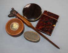 An early 19th century tortoiseshell snuff box, two other snuff boxes, card case and dog's head