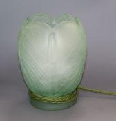 An Art Deco green glass leaf lamp