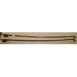 Two round stick violin bows with mother of pearl inlay, one with white metal mount