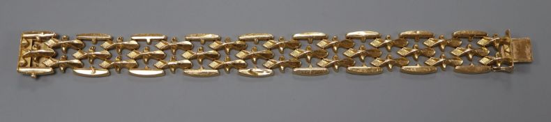 An Italian 750 yellow metal fancy link bracelet, 20cm.