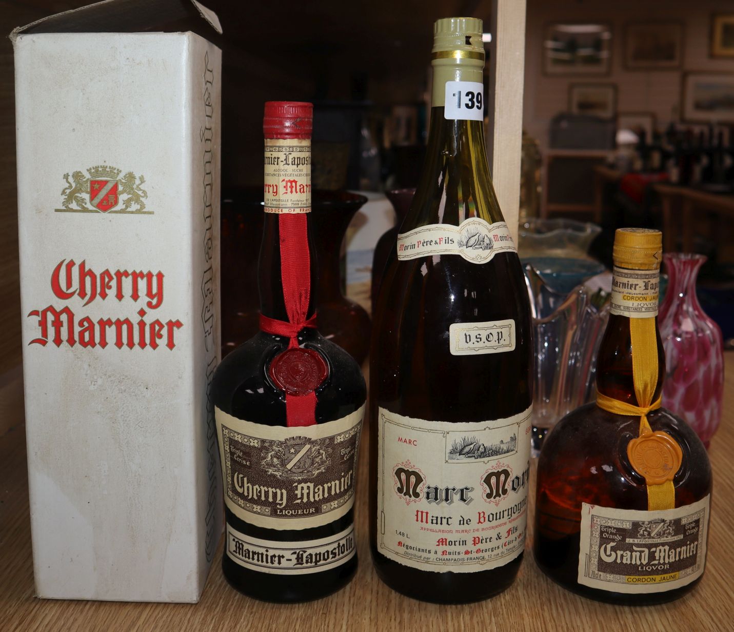 A 1960's Magnum of Marc De Bourgogne VSOP and 2 other bottles of Grand Marnier