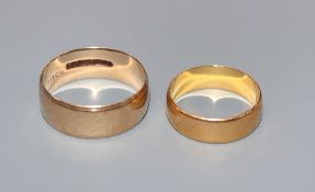 A 22ct gold wedding band and a 9ct gold wedding band.