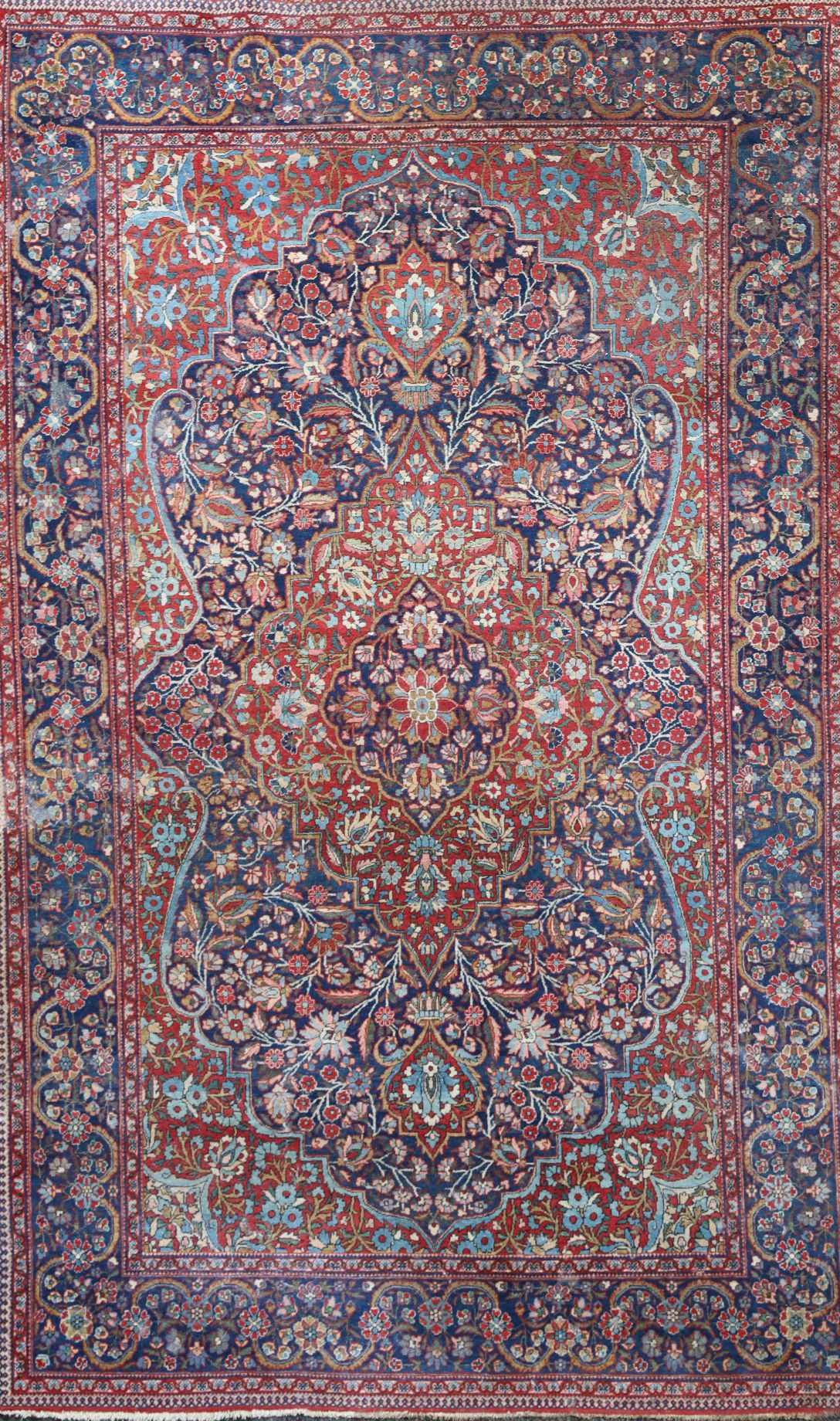 An Isphaphan blue ground medallion rug 210 x 131cm