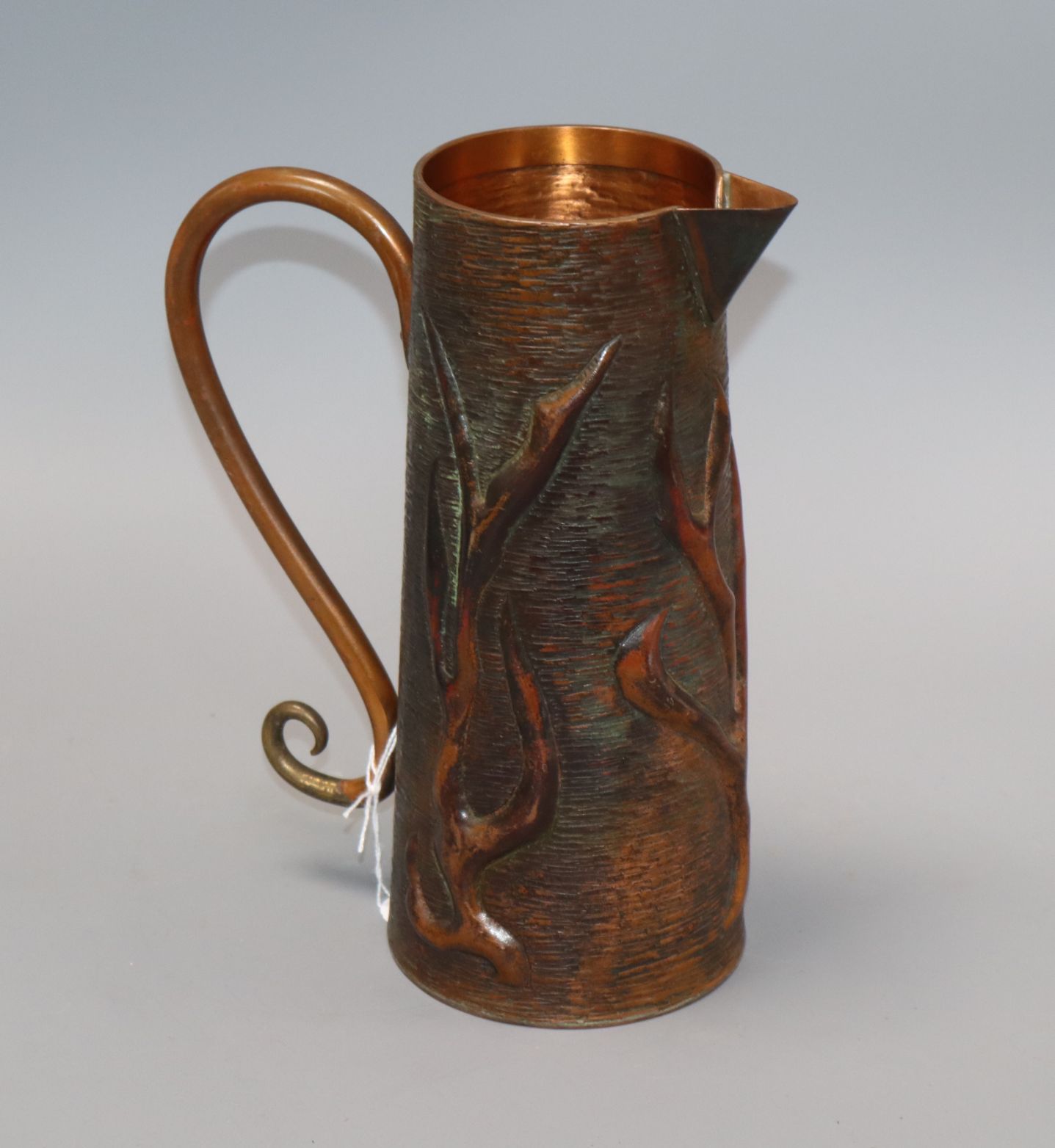 Sam Fanaroff. An embossed copper jug marked S.F. 1979