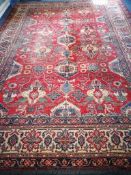 A Caucasian brick red ground carpet 387 x 277cm