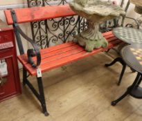 A painted slatted wrought iron garden bench Length 155cm