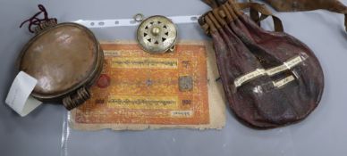 A group of Tibetan objects, including a flint lighter, a bullet bag, two pendants, a relic box and